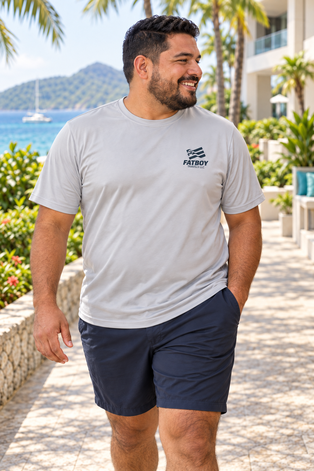 Fatboy Travels Breeze silver performance tee in a coastal travel lifestyle scene